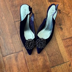 Purple eccentric heels